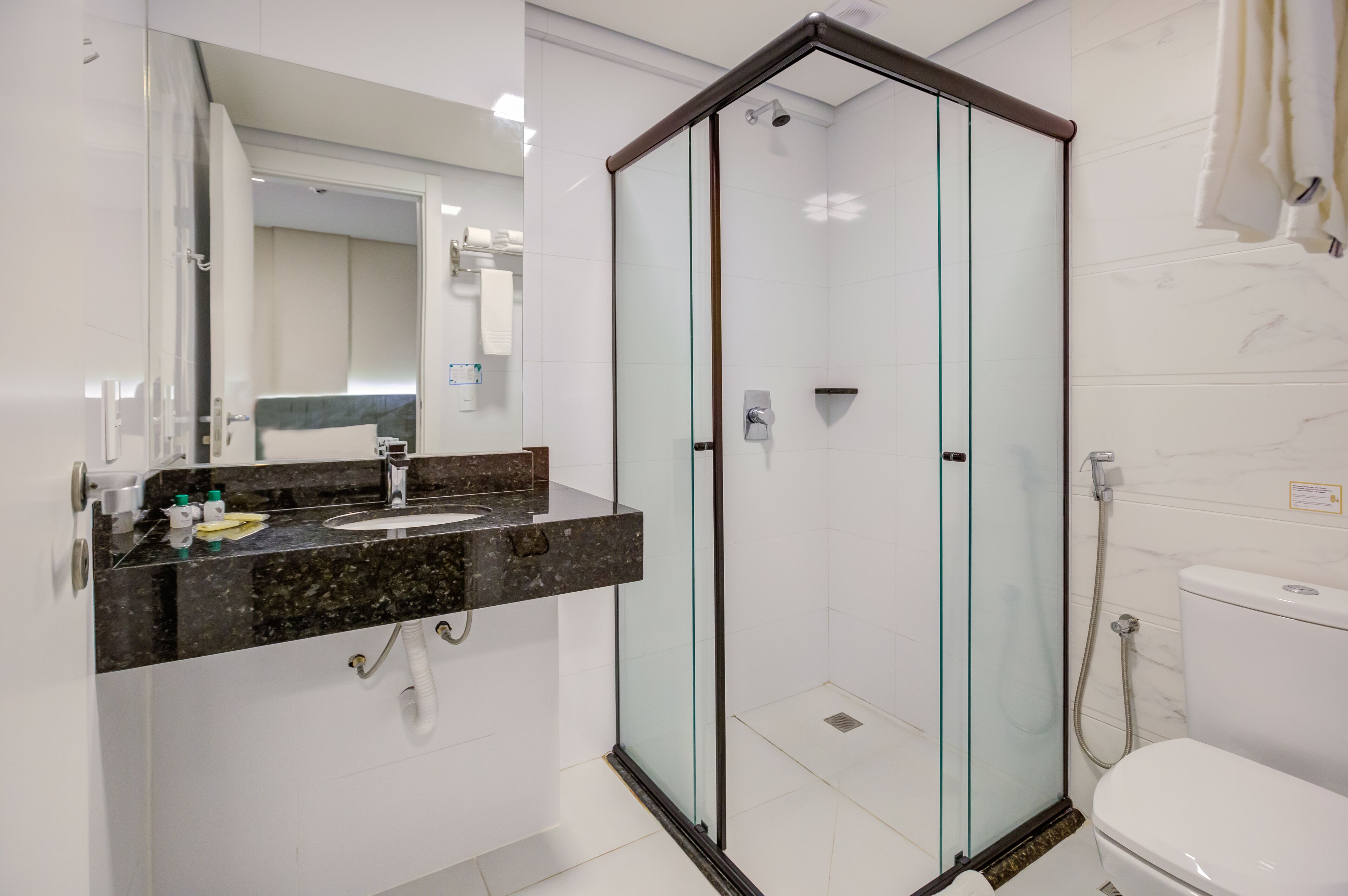 standard double room | bathroom | shower, rainfall showerhead, free toiletries, hair dryer