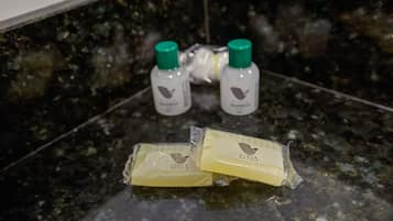 Toiletries on a marble countertop.