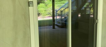 1 Bedroom minutes to beach & a block to trail with  private entrance .