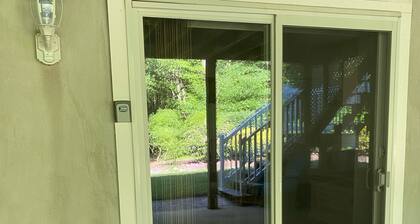 1 Bedroom minutes to beach & a block to trail with private entrance .