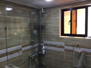 Shower, hair dryer, towels, soap