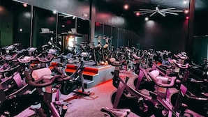 A gym with multiple stationary bikes arranged in rows. - Johnny Cash Inspired 2-Suite Loft In 12 South      |         1 of 7 Themed Lofts at Cowrite, Find Coffee and Tacos Downstairs, Complimentary Spin Class, Walk to Shopping in 12 South, 10 Minutes to Broadway, Parking, 24 Hr Hospitality (Nashville)