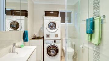 Shower, hair dryer, towels, soap