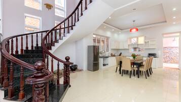 Premium Villa | Living area | 40-inch Smart TV with cable channels, TV