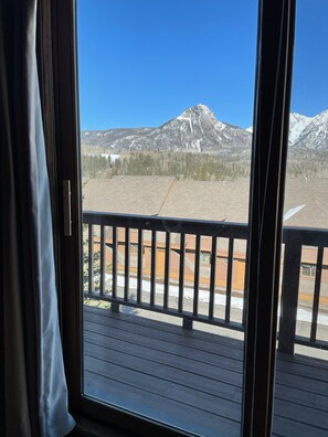 Enjoy breathtaking views of the surrounding mountains from the deck.