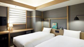 Standard Twin Room, Non Smoking | Down comforters, desk, blackout drapes, free WiFi