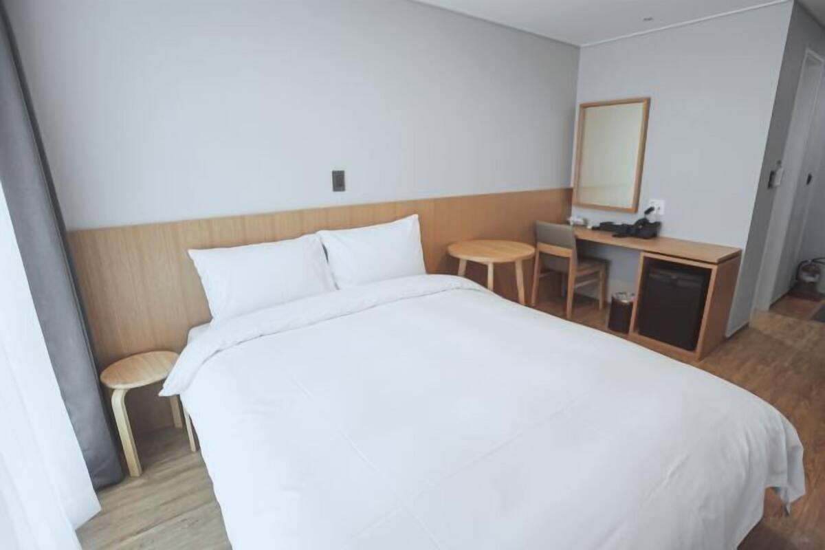 Roupas de cama premium, edredons de pluma, quartos à prova de som