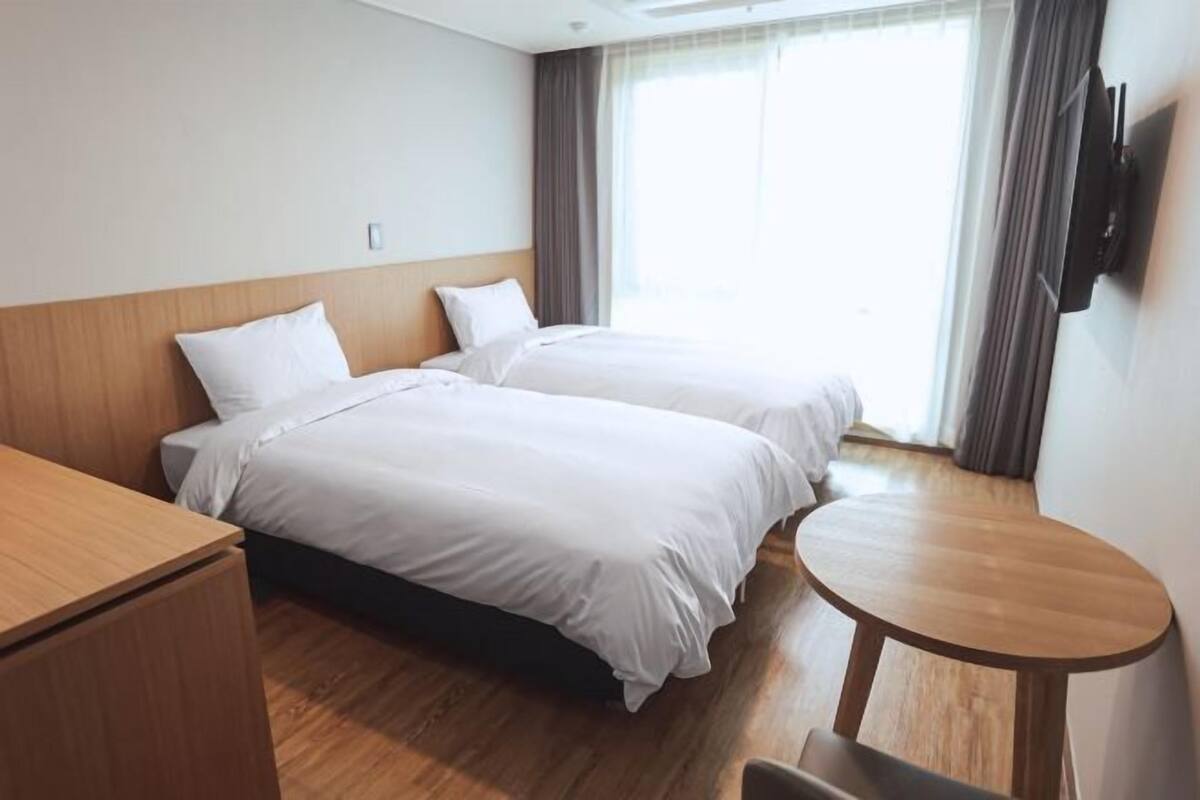 Roupas de cama premium, edredons de pluma, quartos à prova de som