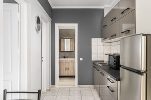 Superior Apartment, 2 Bedrooms, Terrace, Sea View | Private kitchen | Mini-fridge, oven, stovetop, coffee/tea maker - Ionian Sea View Apartments at Barbati by Konnect (Corfu)