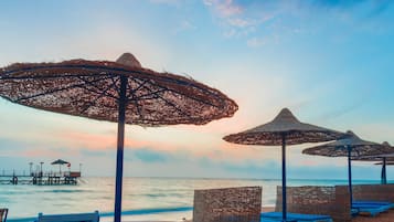 Private beach, sun loungers, beach umbrellas, beach towels