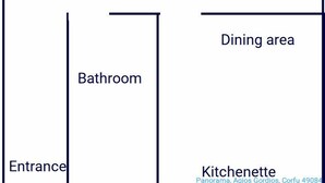 Planta baixa com varanda, dois quartos, área de refeições, banheiro, entrada e cozinha compacta.