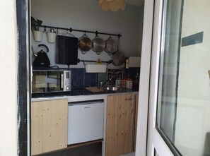 Apartment | Private kitchen | Fridge, microwave, stovetop, coffee/tea maker