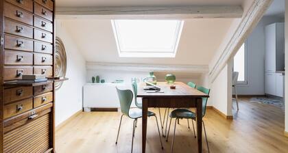 It is a newly renovated attic located in a building from the early 1900s