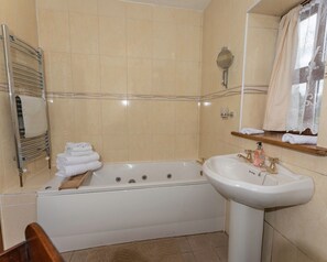 Bathtub, hair dryer, towels