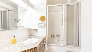 Hair dryer, bathrobes, towels, soap