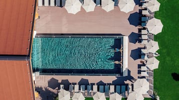 Indoor pool, outdoor pool, open 7:00 AM to 9:00 PM, pool umbrellas
