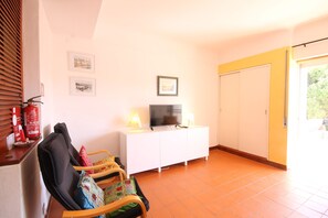Apartment | Living area | 32-inch LCD TV with cable channels, TV
