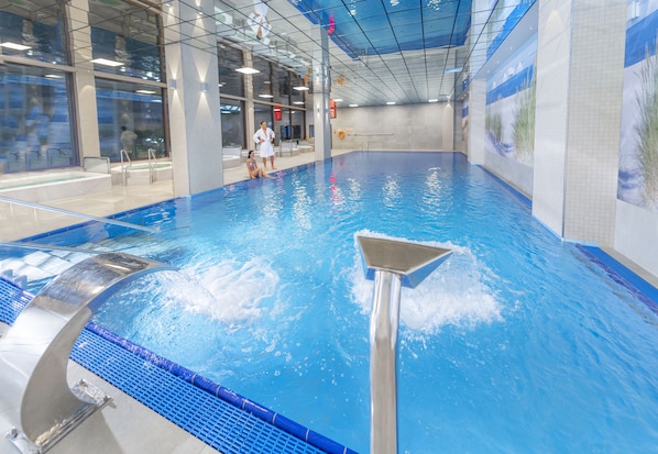 Indoor pool, open 8:00 AM to 8:00 PM, lifeguards on site