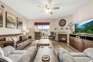 TV, fireplace, offices - Riverside Pigeon Forge Condo W Mt. LeConte Views (Pigeon Forge)