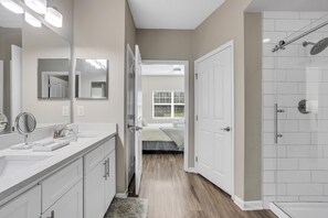 Combined shower/tub, hair dryer, towels, soap