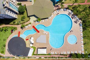 Seasonal outdoor pool, pool umbrellas, pool loungers