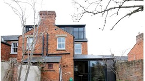 A two-story brick house with a small front garden and a conservatory. - Stunning, Brand New 3BR Home - Central Oxford - Pass the Keys (Oxford)