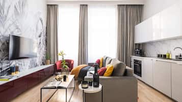 Apartamento urbano | Sala de estar | TV de tela plana 32 polegadas com canais a cabo, TV