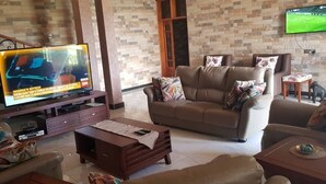 Living area - Fort Heights Homestay (Fort Portal)