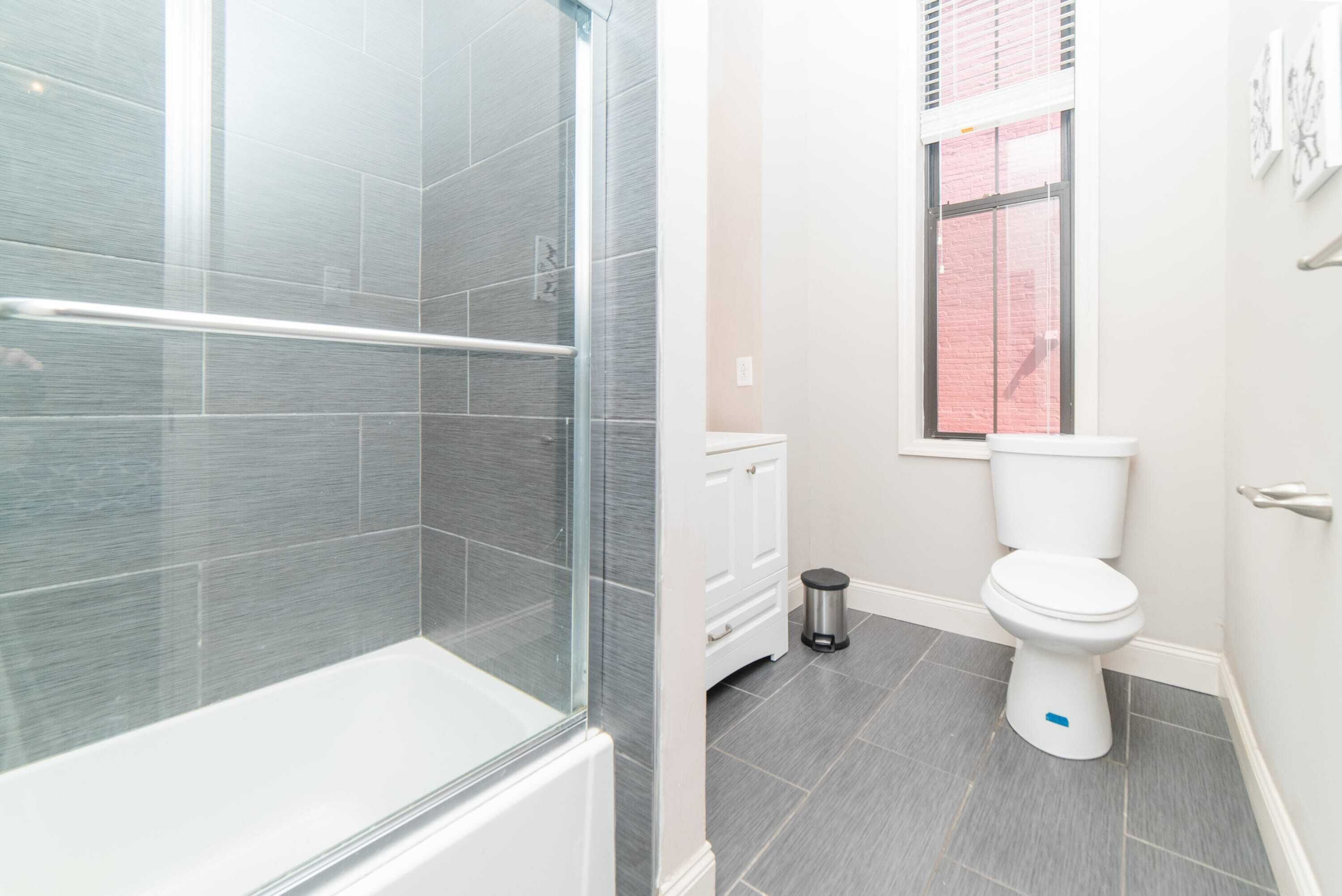 Shower, hair dryer, towels, shampoo