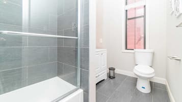 Shower, hair dryer, towels, shampoo