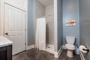 Bathtub, hair dryer, towels