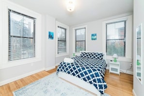 1 bedroom, desk, iron/ironing board, travel crib