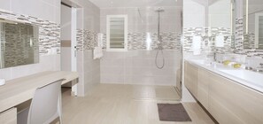 Bathtub, hair dryer, towels