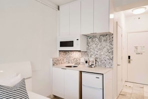 Fridge, microwave, coffee/tea maker, toaster