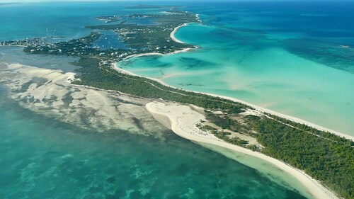 Pink Bikini Island Cottage with a dock on Black Sound