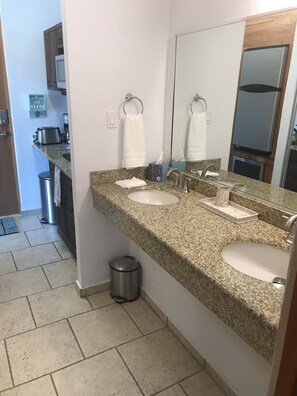 Fridge, microwave, stovetop, coffee/tea maker