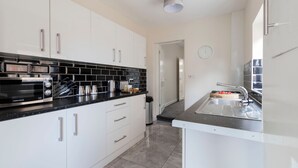 Apartment | Private kitchen | Fridge, microwave, oven, stovetop