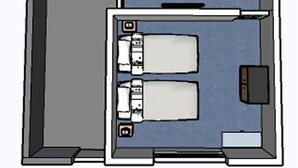 A floor plan of a hotel room with a bed, a desk, a chair, a small table, a sofa, and a bathroom. - Modern 1 Bedroom Flat in St Helens – Ideal for Relocation or Work Trips (St Helens)