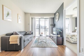 1 bedroom, desk, iron/ironing board, travel crib