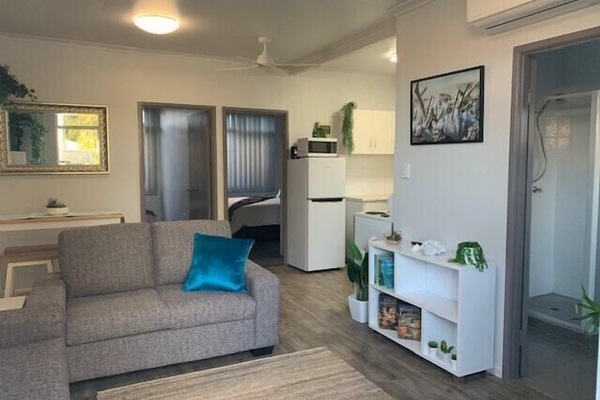 This cozy unit provides everything you need for a comfortable stay.