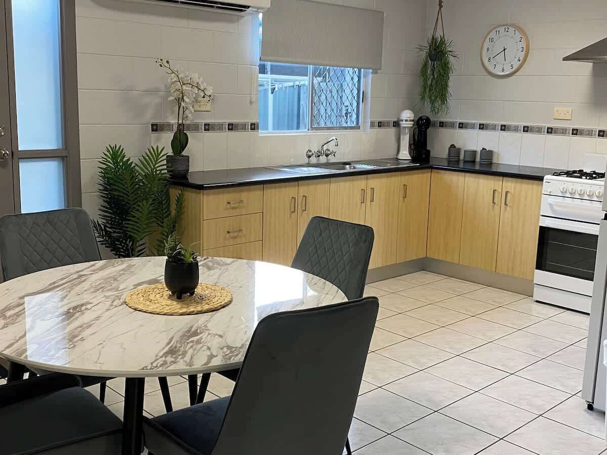 Gather around the table for a long breakfast or a proper home cooked dinner. The kitchen sits right alongside, so whoever is cooking never misses the conversation.