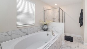 Combined shower/bathtub, hair dryer, towels, soap - Storey Lake Resort 6 Bedroom Private Pool Home with Game Room (Kissimmee)