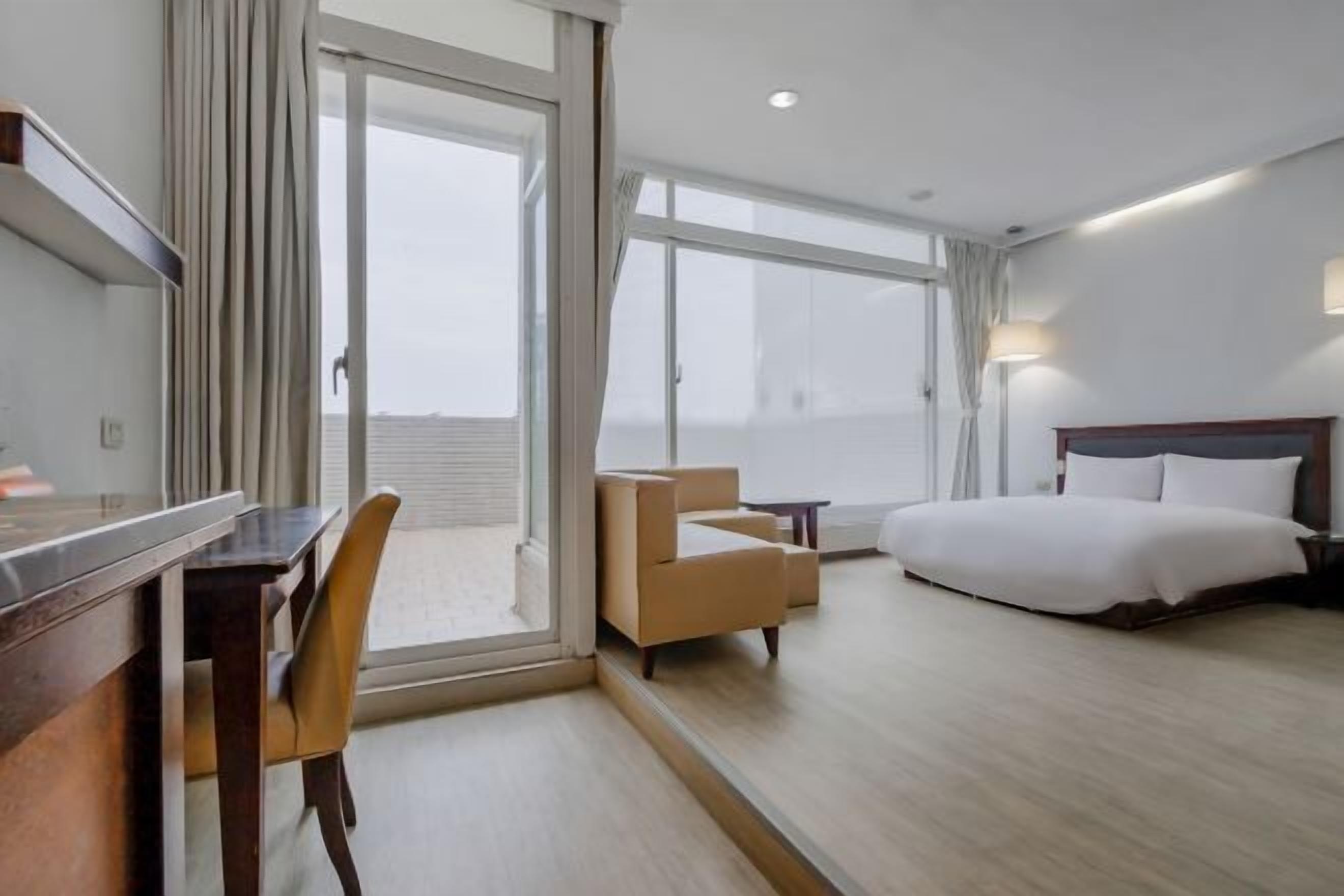 Desk, laptop workspace, free WiFi, bed sheets