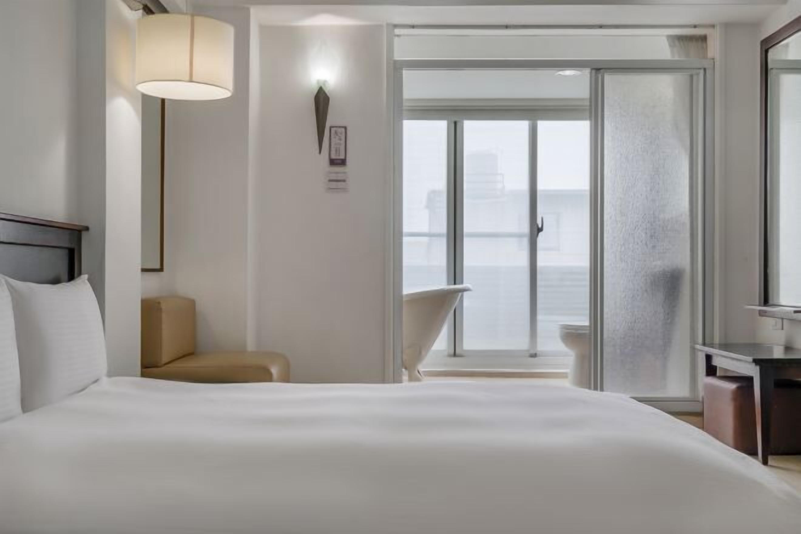 Desk, laptop workspace, free WiFi, bed sheets