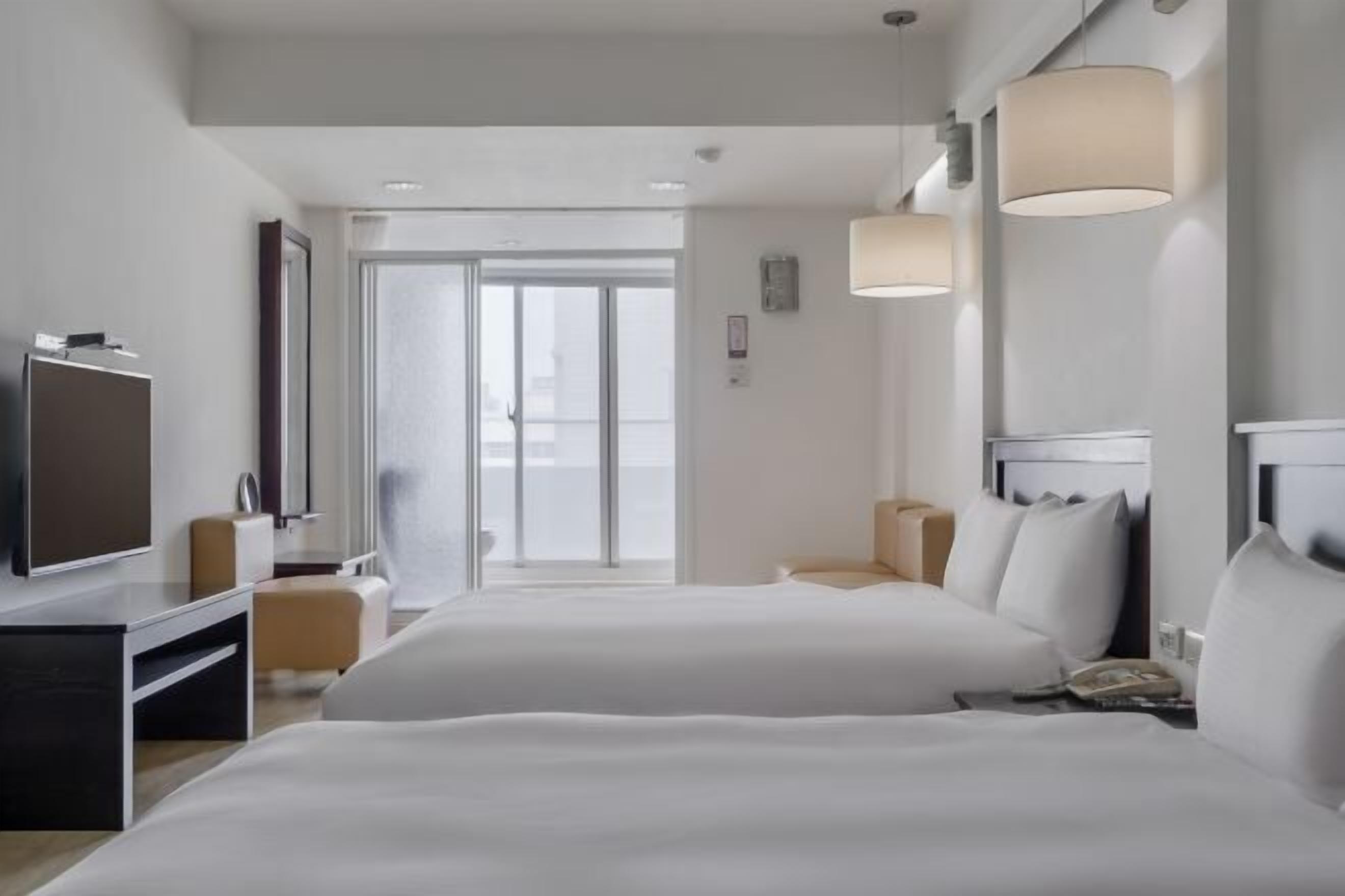 Desk, laptop workspace, free WiFi, bed sheets