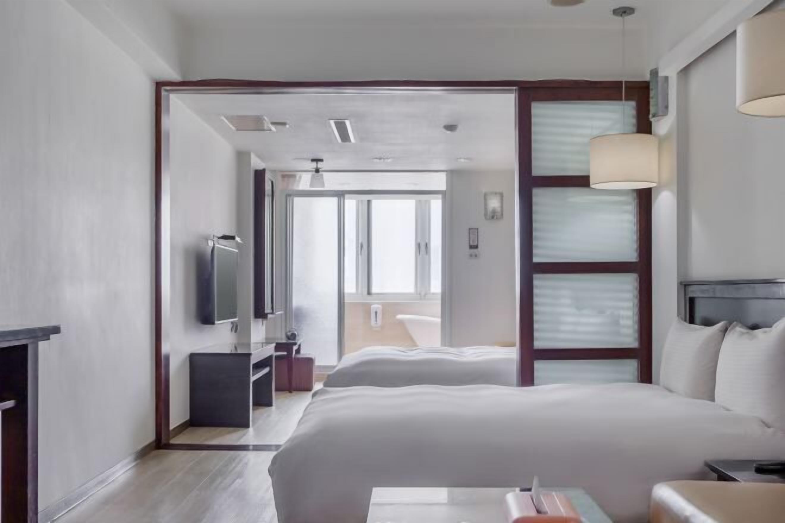 Desk, laptop workspace, free WiFi, bed sheets