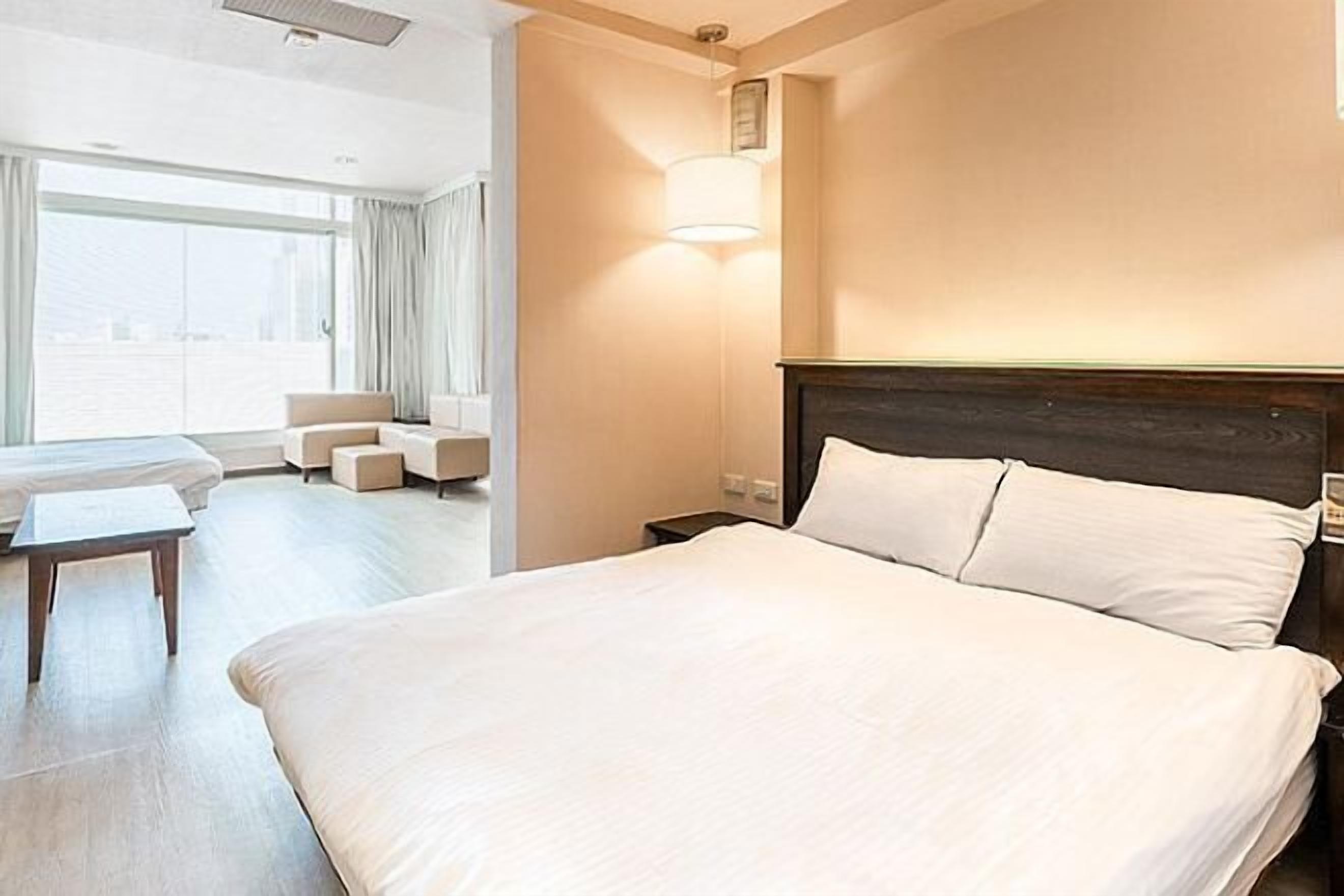 Desk, laptop workspace, free WiFi, bed sheets