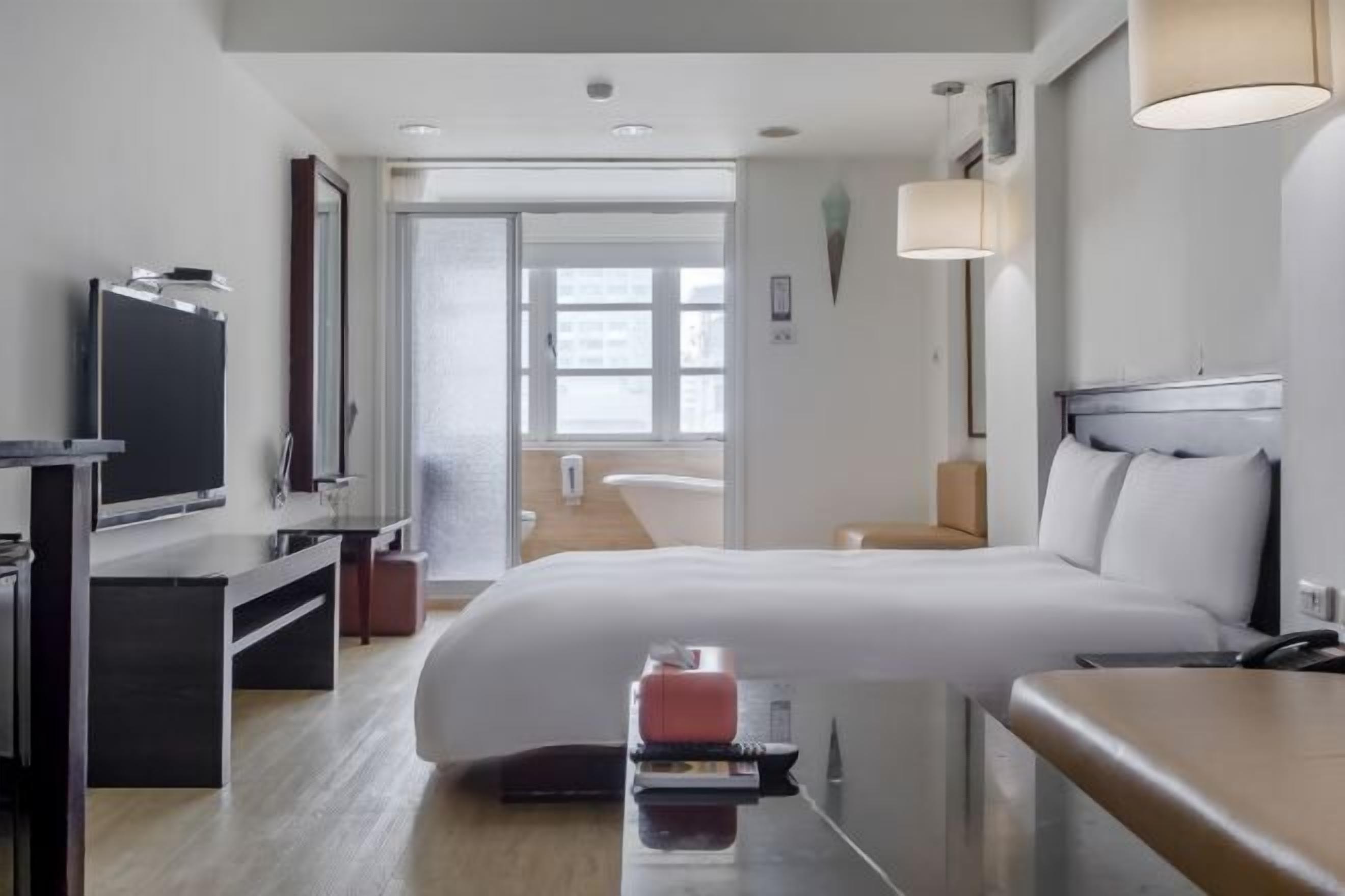 Desk, laptop workspace, free WiFi, bed sheets