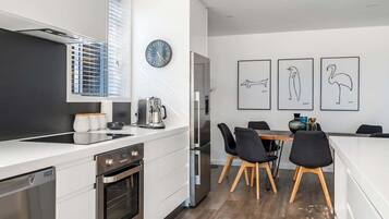 Coffee/tea maker, fridge, microwave, oven
