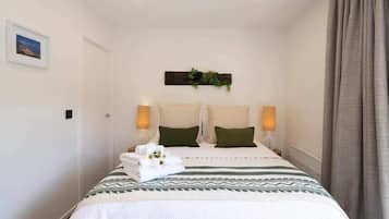 2 bedrooms, premium bedding, iron/ironing board, travel cot